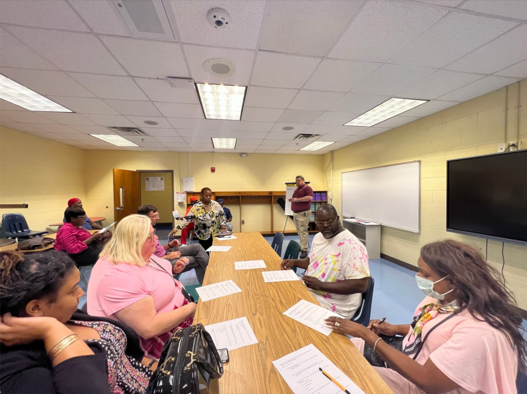 Barbara Marlin (left) engages with residents of Macon-Bibb County during a Beeck-led activity — one of many concept testing and focus group discussions that helped shape community-led solutions to reduce blight. 